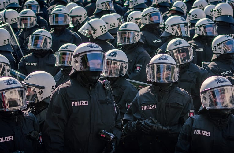 Germany STASI Cops threaten citizens who video migrant brawls